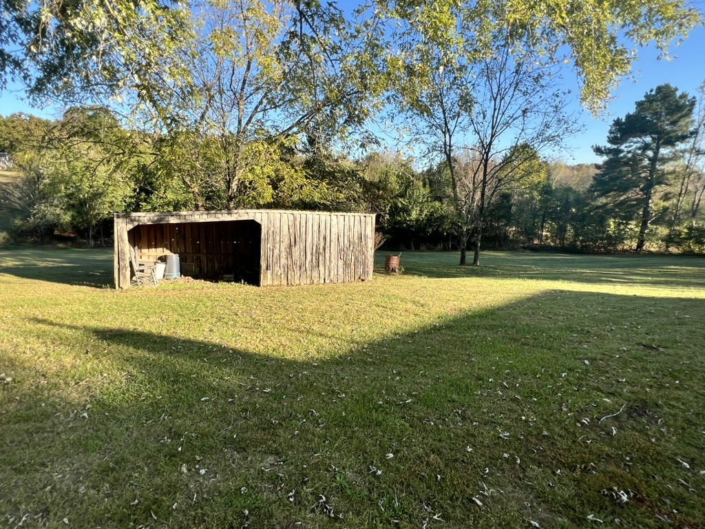 948 North Brace Road Summertown, TN 38483 - Photo 44 of 59 a swimming pool with trees in the background
