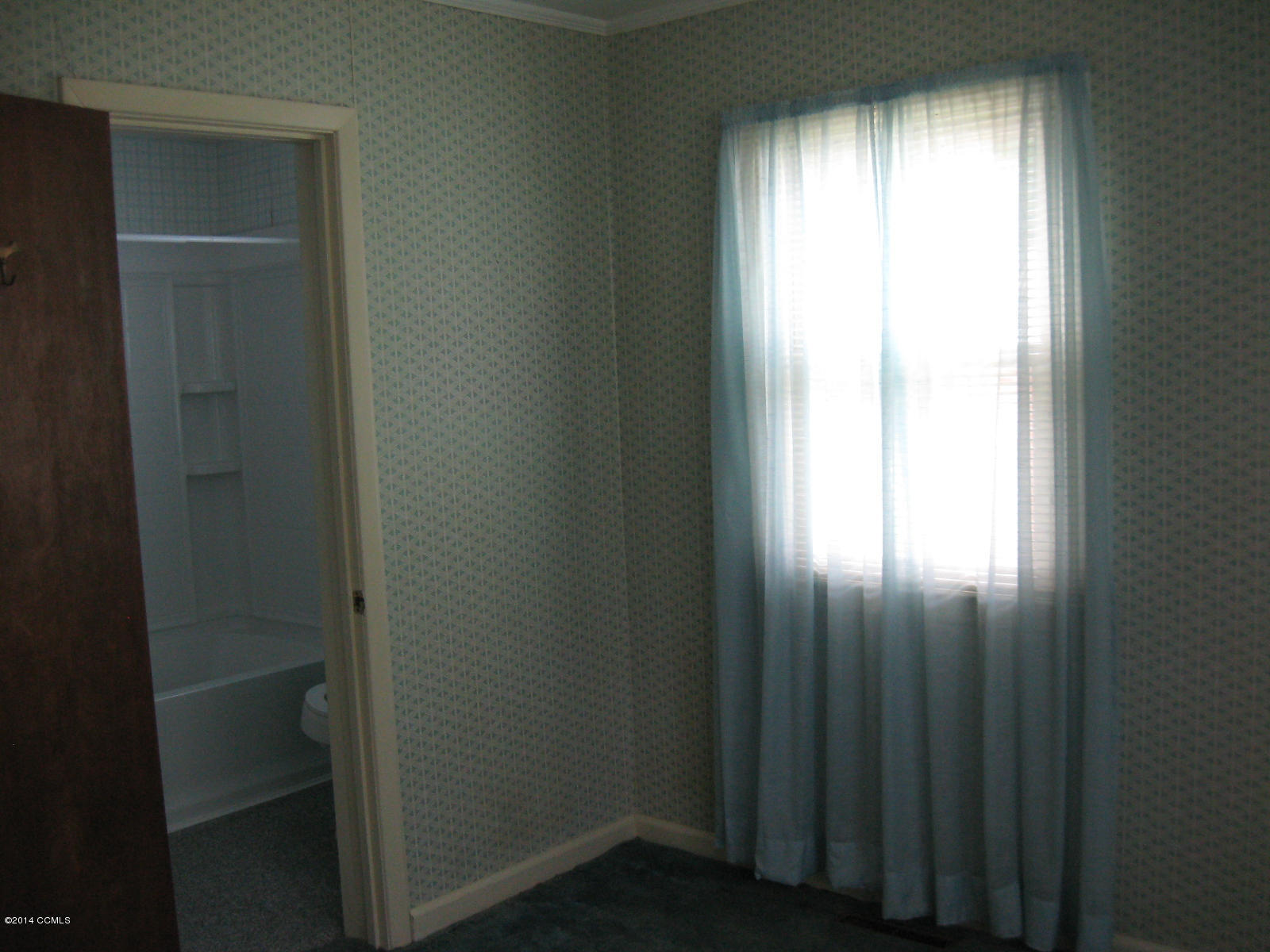 4109 Country Club Road Morehead City, NC 28557 - Photo 19 of 31 Master Bedroom looking into Master Bath