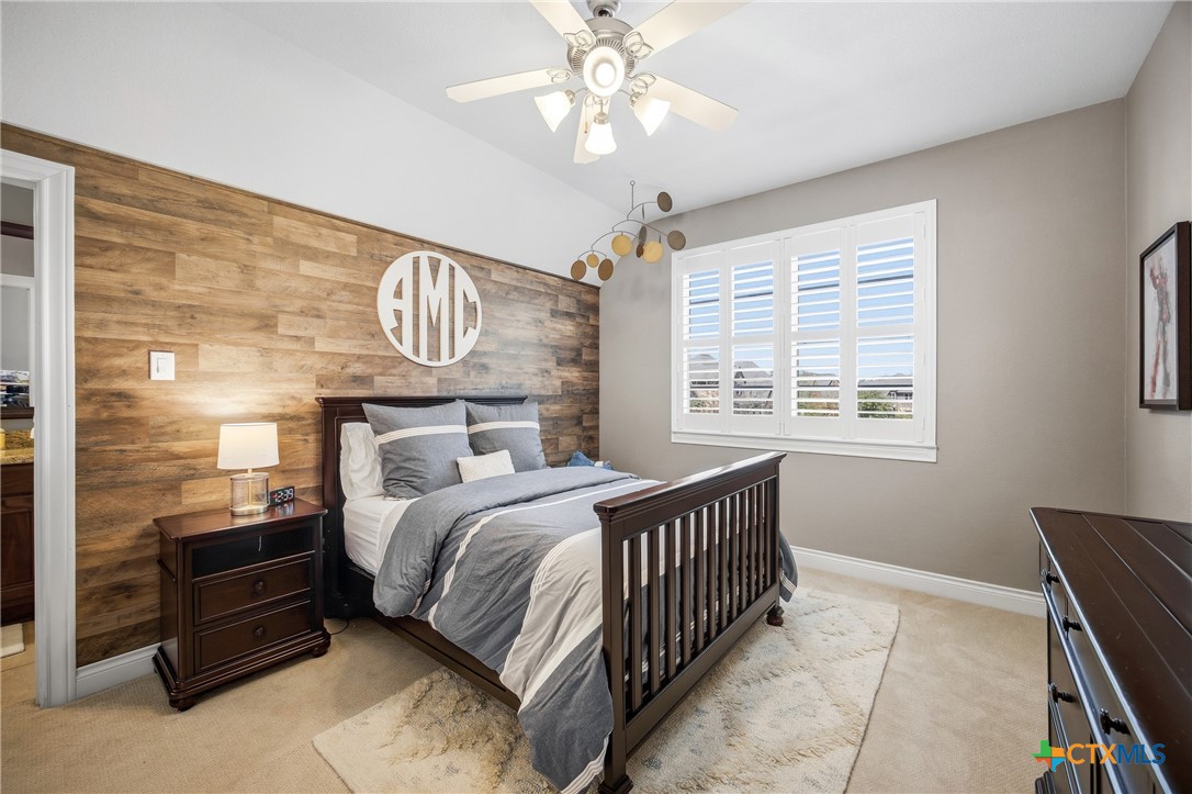 2427 Anderson Point Lane Spring, TX 77388 - Photo 32 of 47 a bedroom with a bed and a window