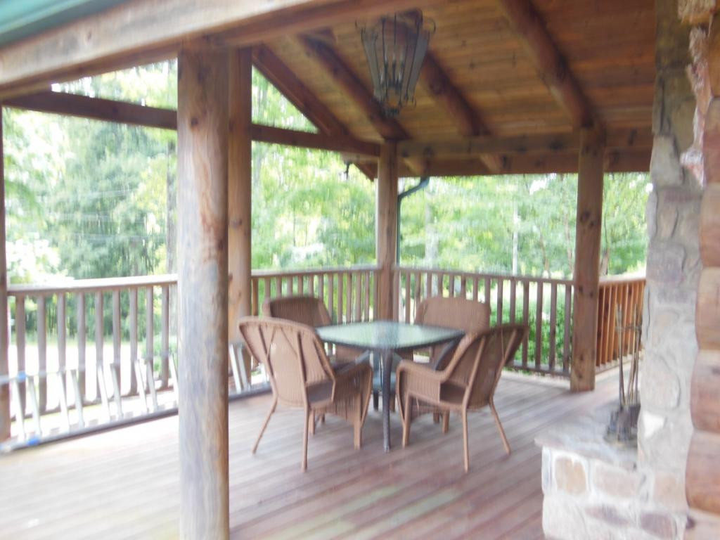1202 May's Rdg Road Butler, TN 37640 - Photo 15 of 29 Covered deck with Fireplace