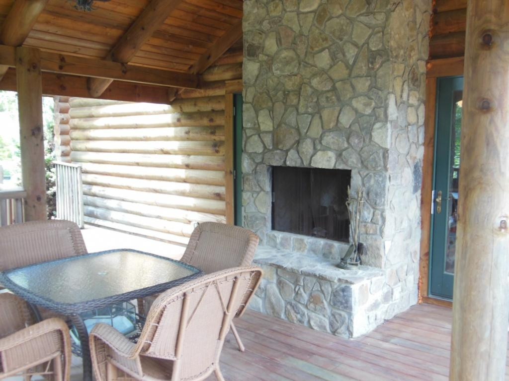 1202 May's Rdg Road Butler, TN 37640 - Photo 16 of 29 Outdoor Fireplace