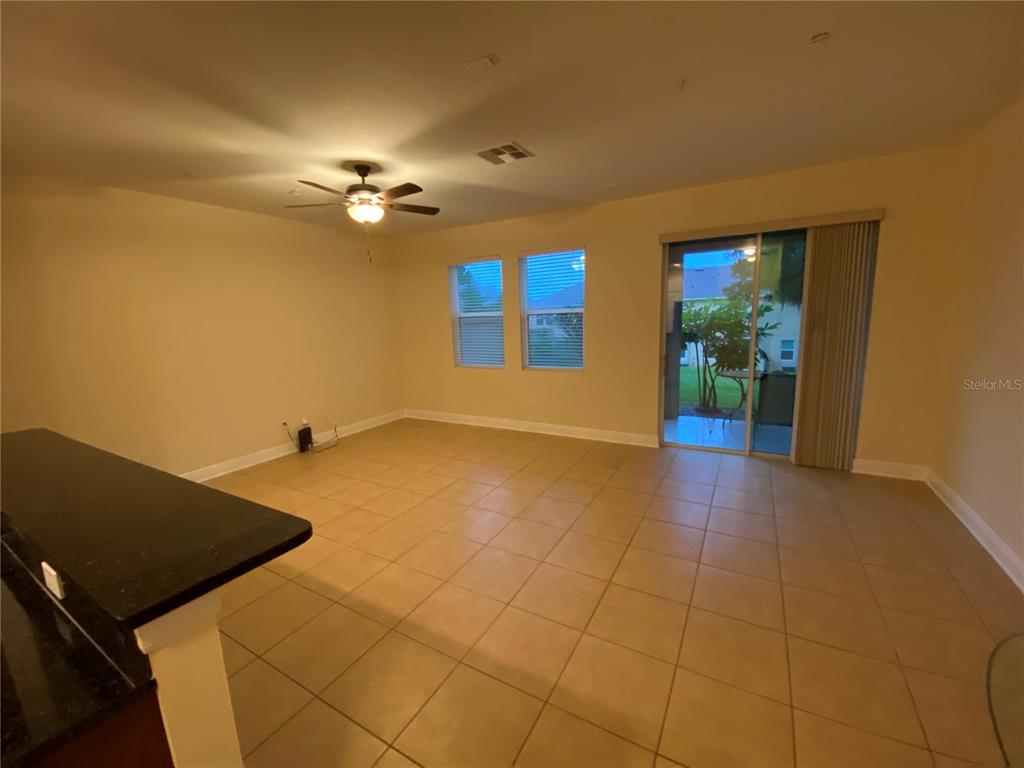 1772 Marsh Palm Parkway Ocoee, FL 34761 - Photo 2 of 29 a view of an empty room with a window
