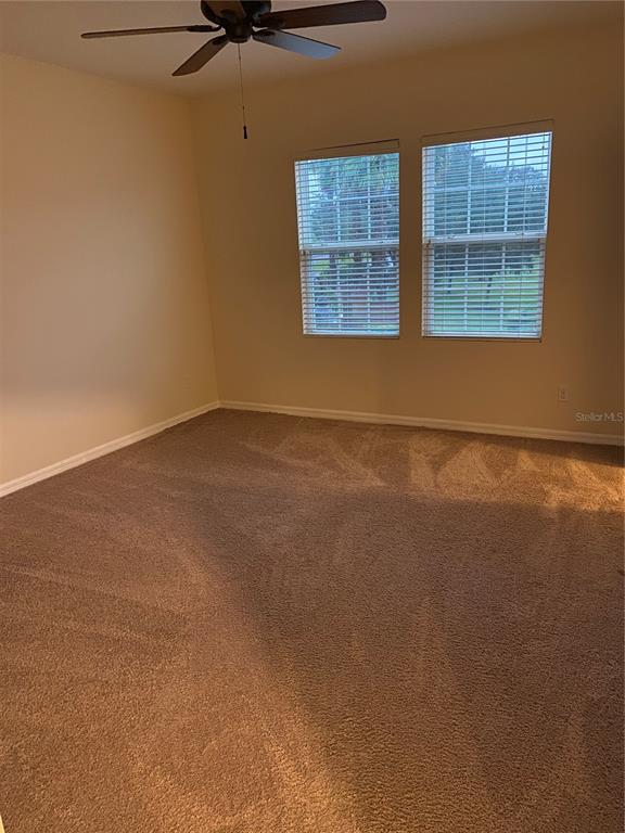 1772 Marsh Palm Parkway Ocoee, FL 34761 - Photo 26 of 29 an empty room with windows