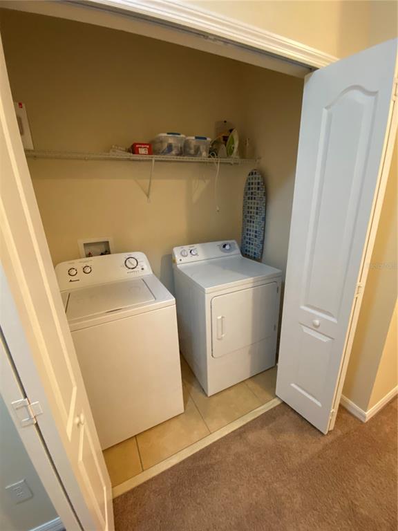 1772 Marsh Palm Parkway Ocoee, FL 34761 - Photo 27 of 29 a utility room with dryer and washer
