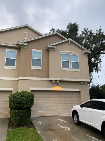 a kitchen with a sink and a refrigerator
