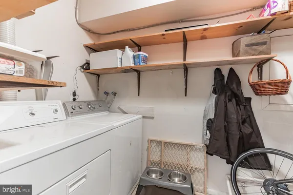 a utility room with dryer and washer