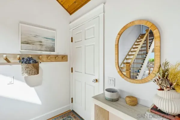 a bedroom with furniture and a book shelf