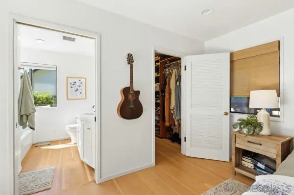 a utility room with sink dryer and washer
