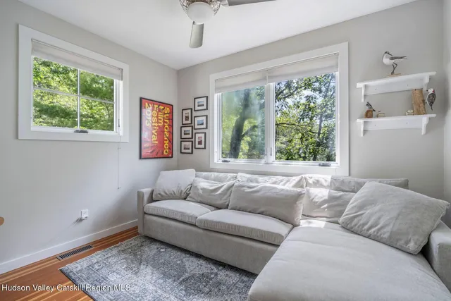 a bedroom with a bed and a cabinets