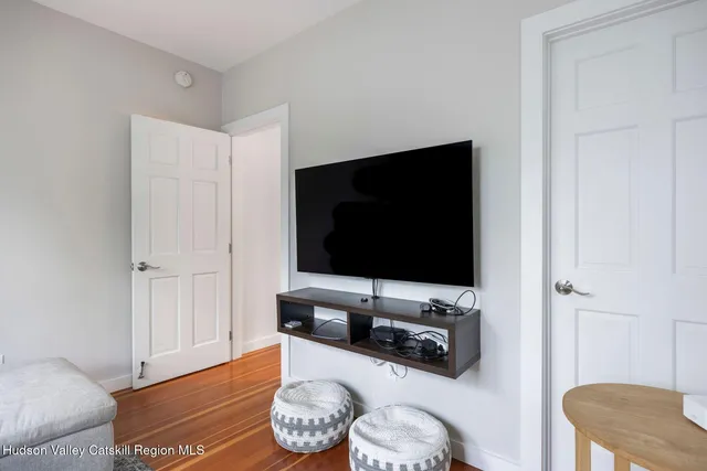 a bathroom with a sink a shower and a bathtub