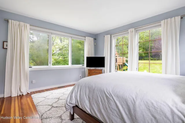 a view of a swimming pool with a yard