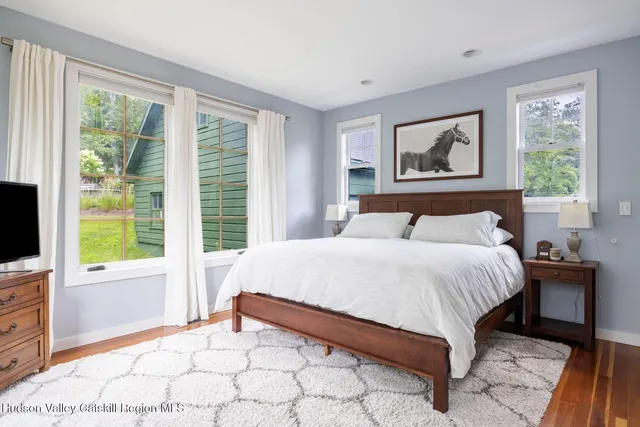 a view of a backyard with sitting area