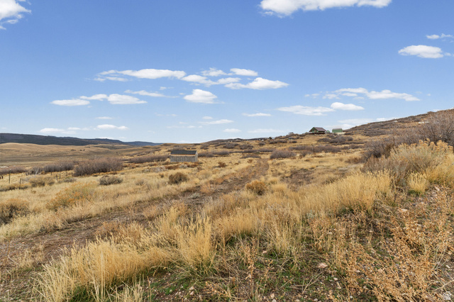 349 West Mountain View Road, Unit 349 Fairview, UT 84629 - Photo 21 of 26 Expansive open land featuring diverse natural vegetation and a distant structure