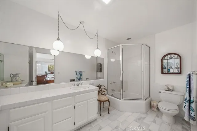 a living room with furniture and a gate