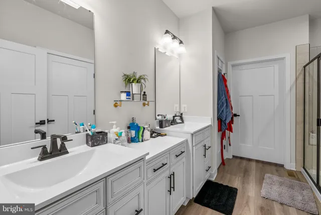 a living room with a flat screen tv and a couch