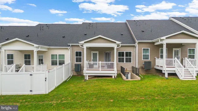 a view of a two chairs in the deck