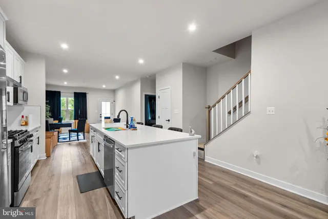 a view of kitchen and sink