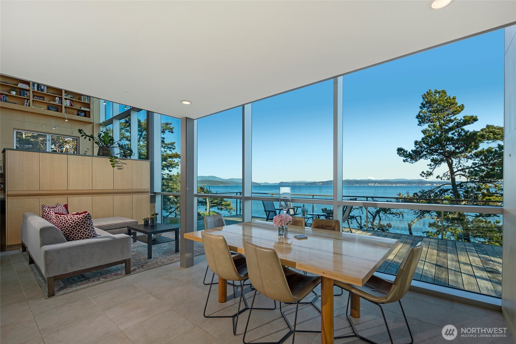 2623 Pear Point Road Friday Harbor, WA 98250 - Photo 13 of 40 a dining room with furniture and a floor to ceiling window
