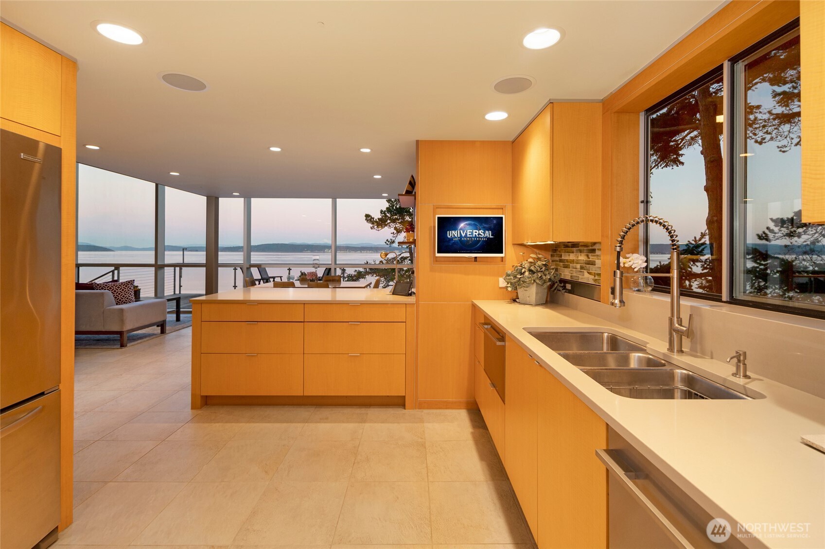 2623 Pear Point Road Friday Harbor, WA 98250 - Photo 15 of 40 a large kitchen with stainless steel appliances kitchen island granite countertop a sink and cabinets
