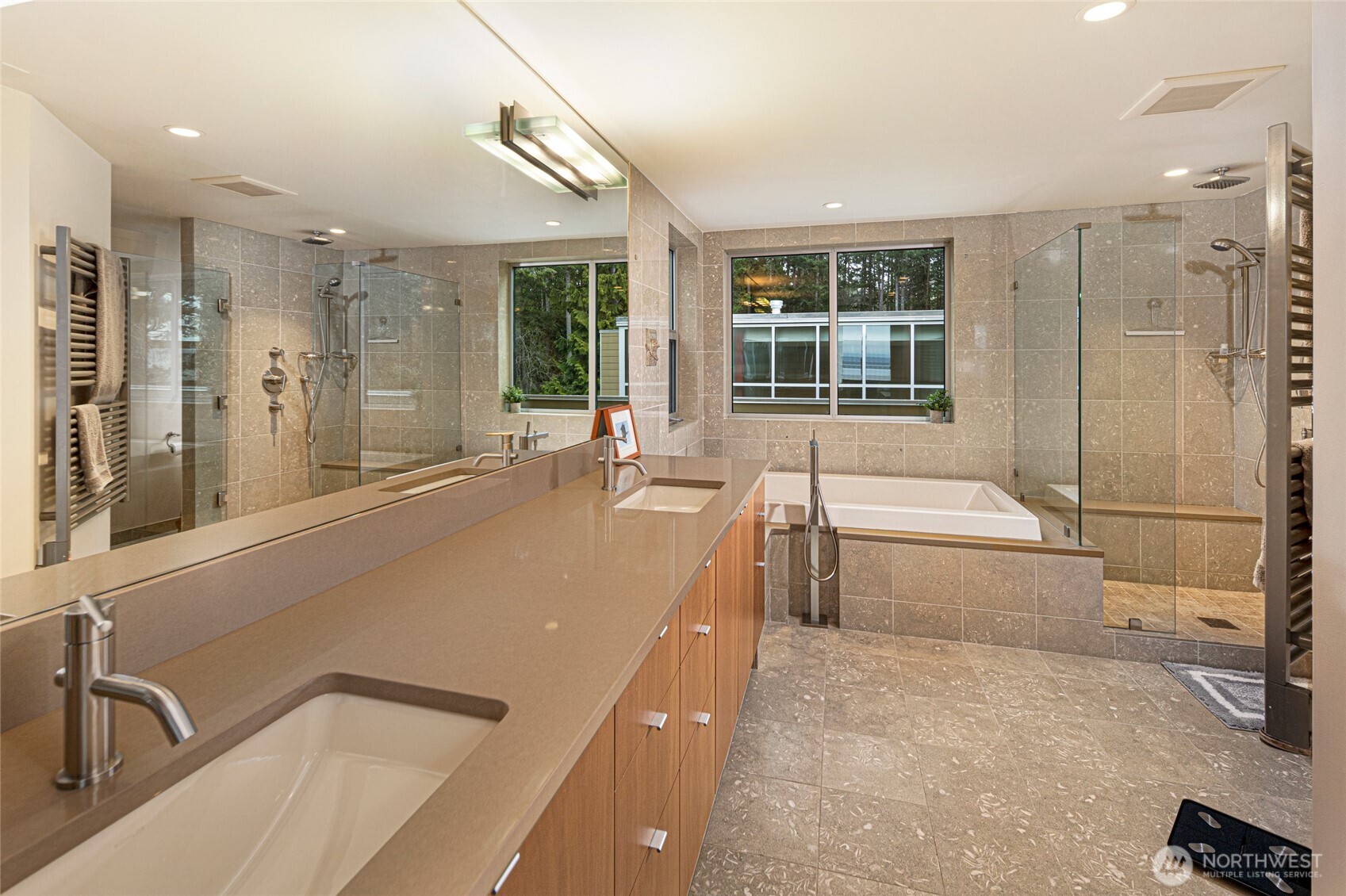 2623 Pear Point Road Friday Harbor, WA 98250 - Photo 24 of 40 a spacious bathroom with a tub a sink a mirror and a shower