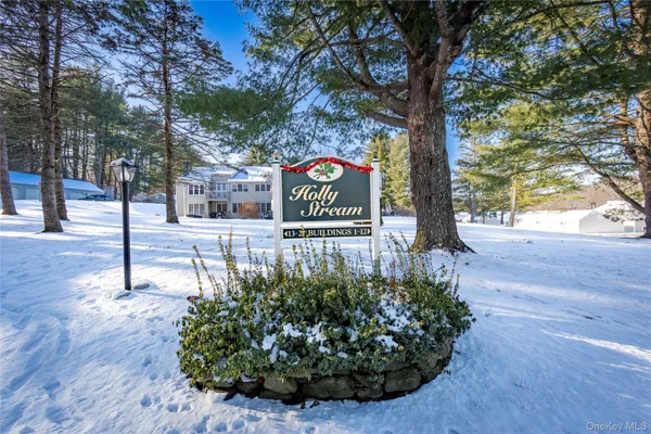 a sign that is sitting in the garden