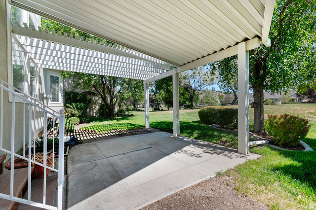 1417 Blacksmith Lane Draper, UT 84020 - Photo 42 of 57 Covered patio with a slatted pergola extension and a concrete surface