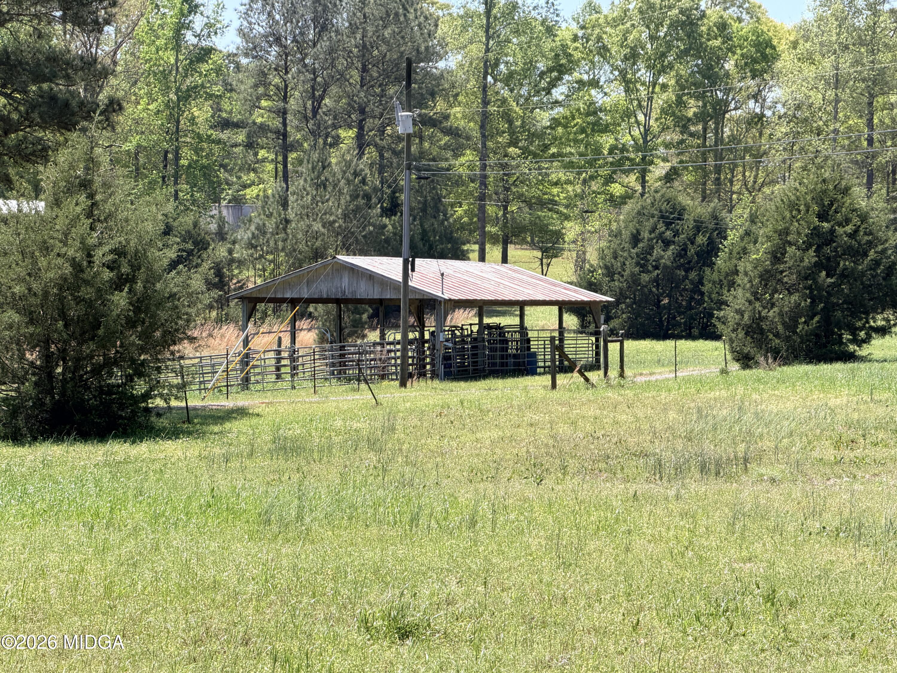 11190 Treadwell Road Forsyth, GA 31029 - Photo 11 of 30 Cattle Barn with Electric & Water