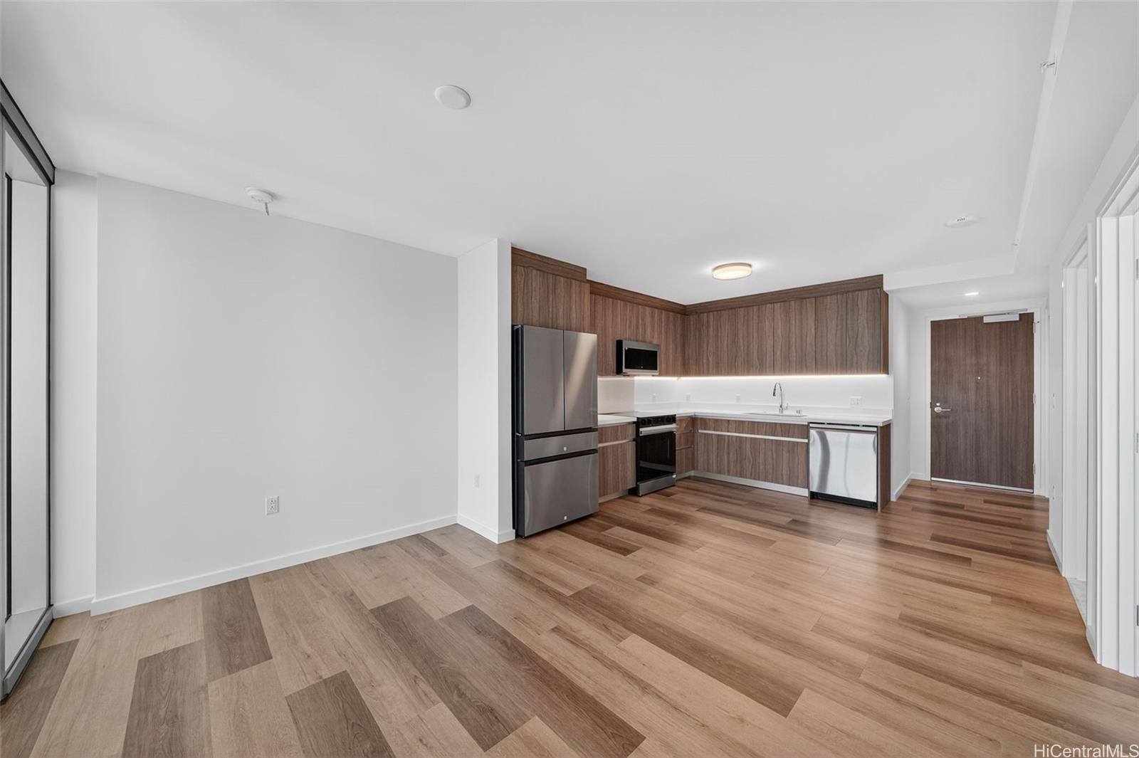 1500 Rycroft Street, Unit 4103R Honolulu, HI 96814 - Photo 5 of 25 a kitchen with a sink cabinets and stainless steel appliances