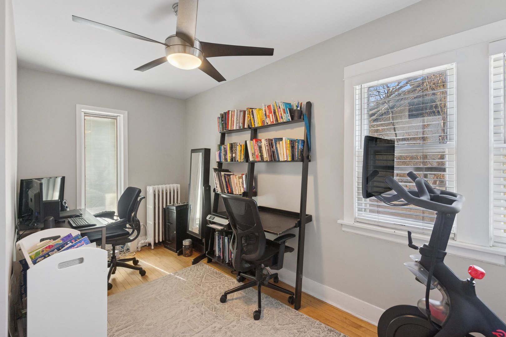 2233 West Greenleaf Avenue Chicago, IL 60645 - Photo 18 of 23 a view of a workspace with furniture and a window