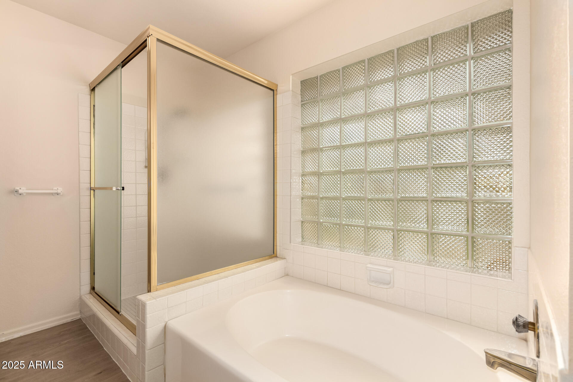 2059 East Brown Road, Unit 30 Mesa, AZ 85213 - Photo 12 of 24 a bathroom with a shower and a window
