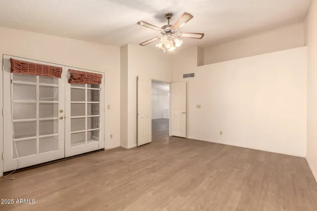 a view of kitchen with cabinets and wooden floor