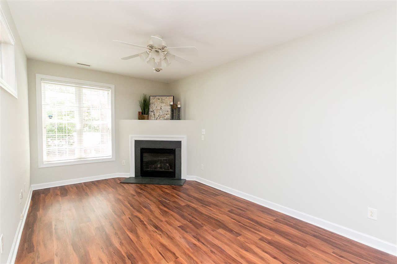 4675 Pooh Corner Drive Raleigh, NC 27616 - Photo 4 of 10 Lots of natural light and plenty of wall space for furniture. Living Room