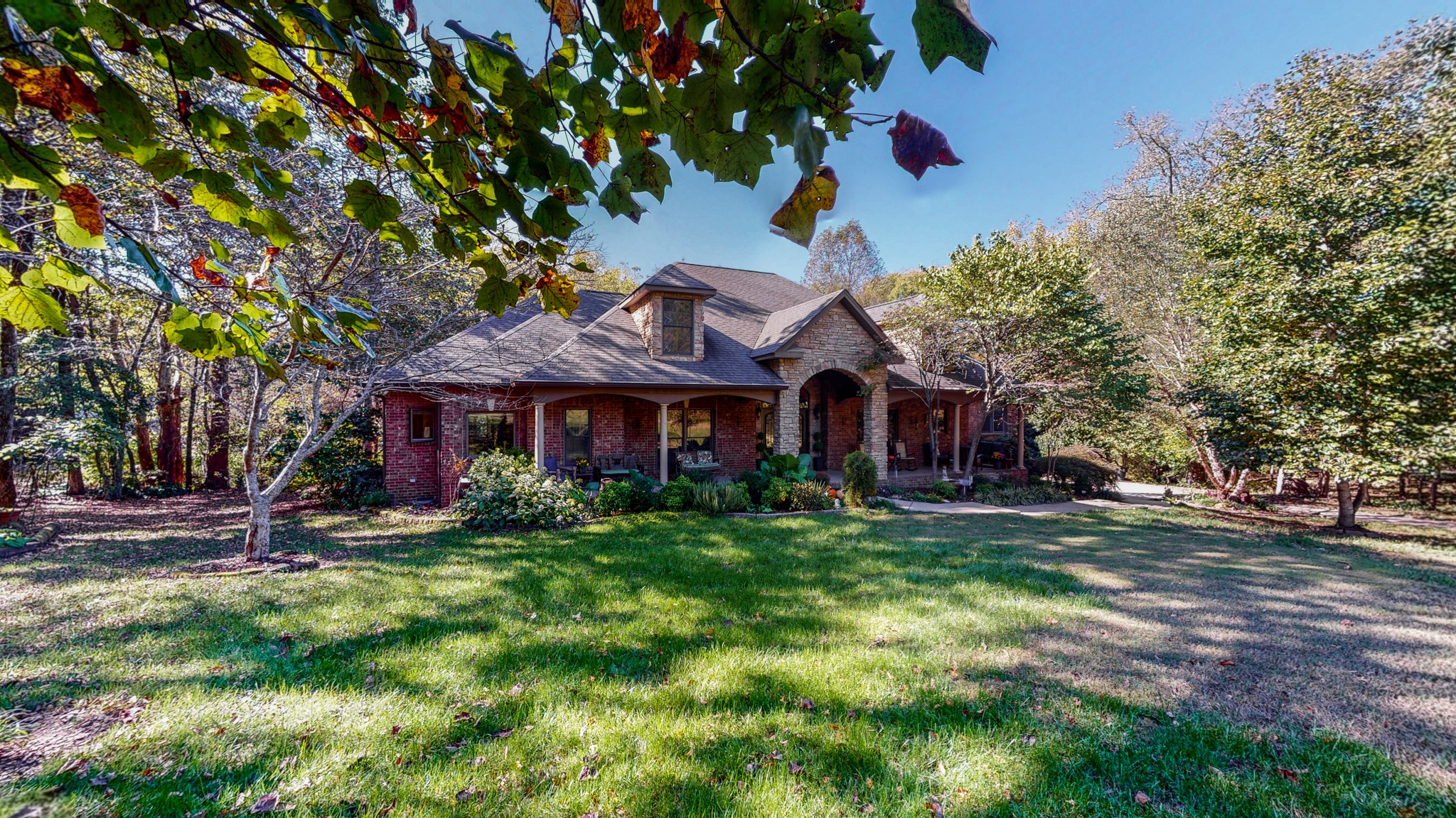 841 Vanderbilt Road Mount Juliet, TN 37122 - Photo 2 of 50 a front view of a house with a garden