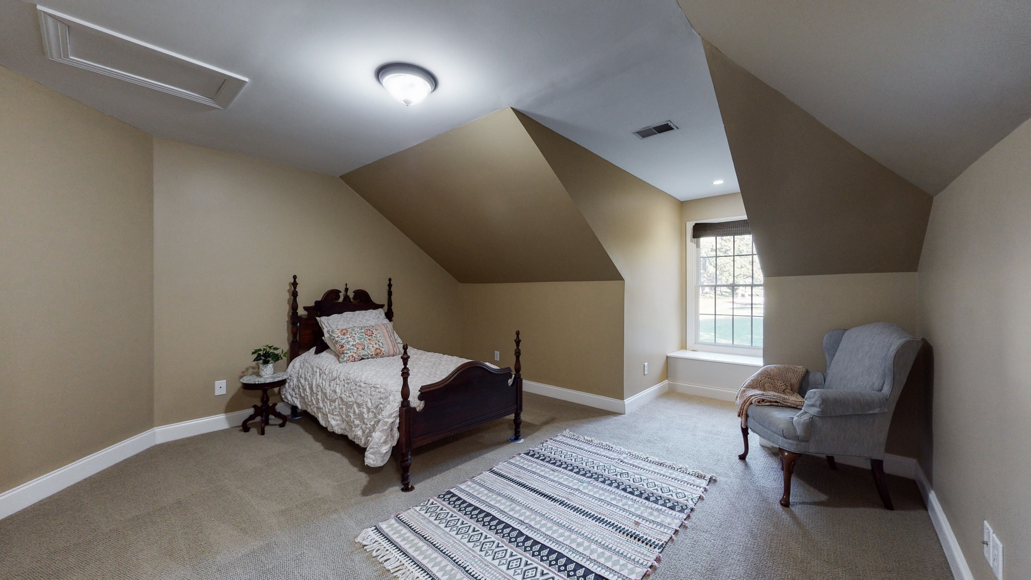 841 Vanderbilt Road Mount Juliet, TN 37122 - Photo 33 of 50 a bedroom with a bed and a chair