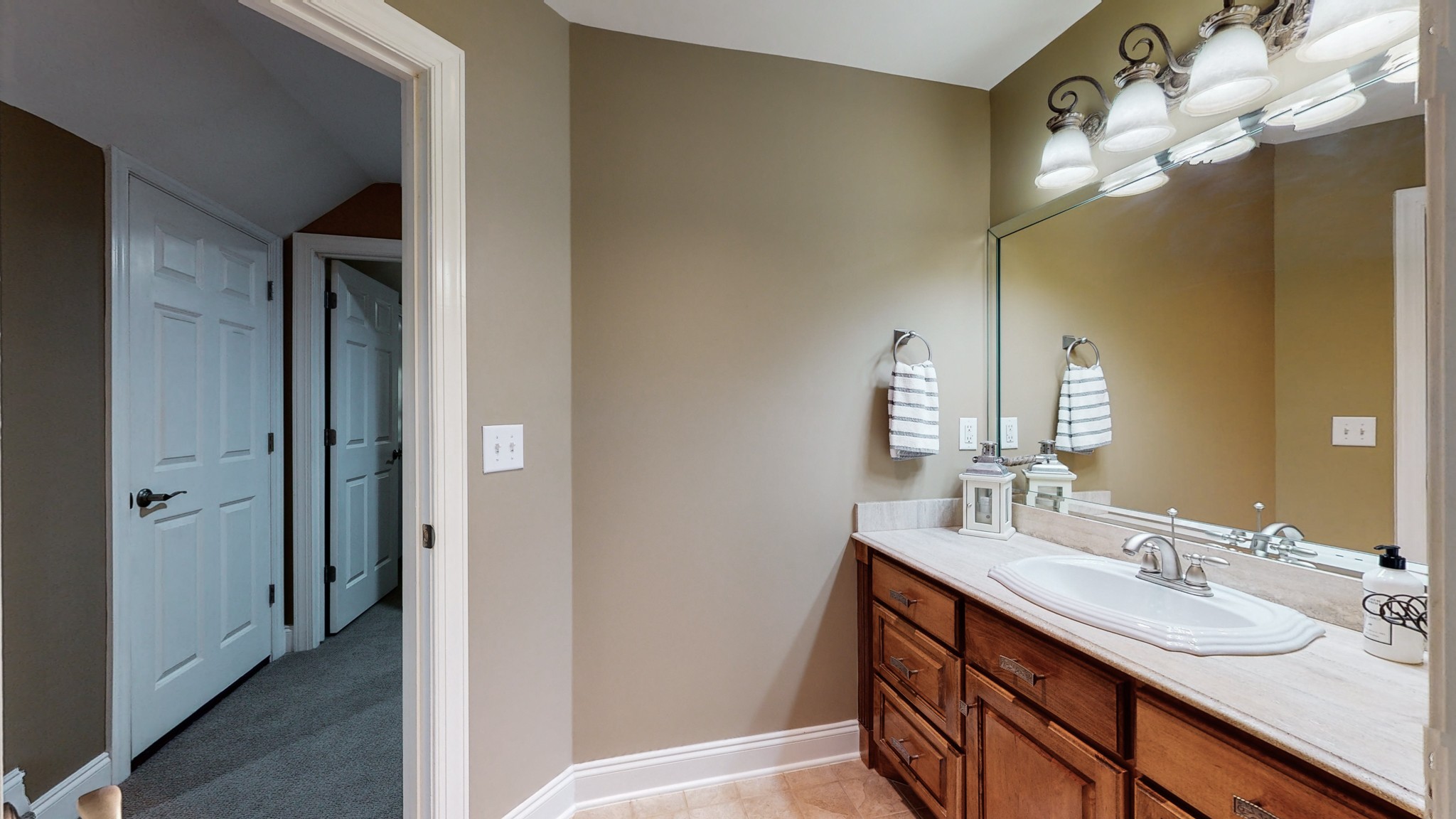 841 Vanderbilt Road Mount Juliet, TN 37122 - Photo 35 of 50 a bathroom with a double vanity sink and a mirror