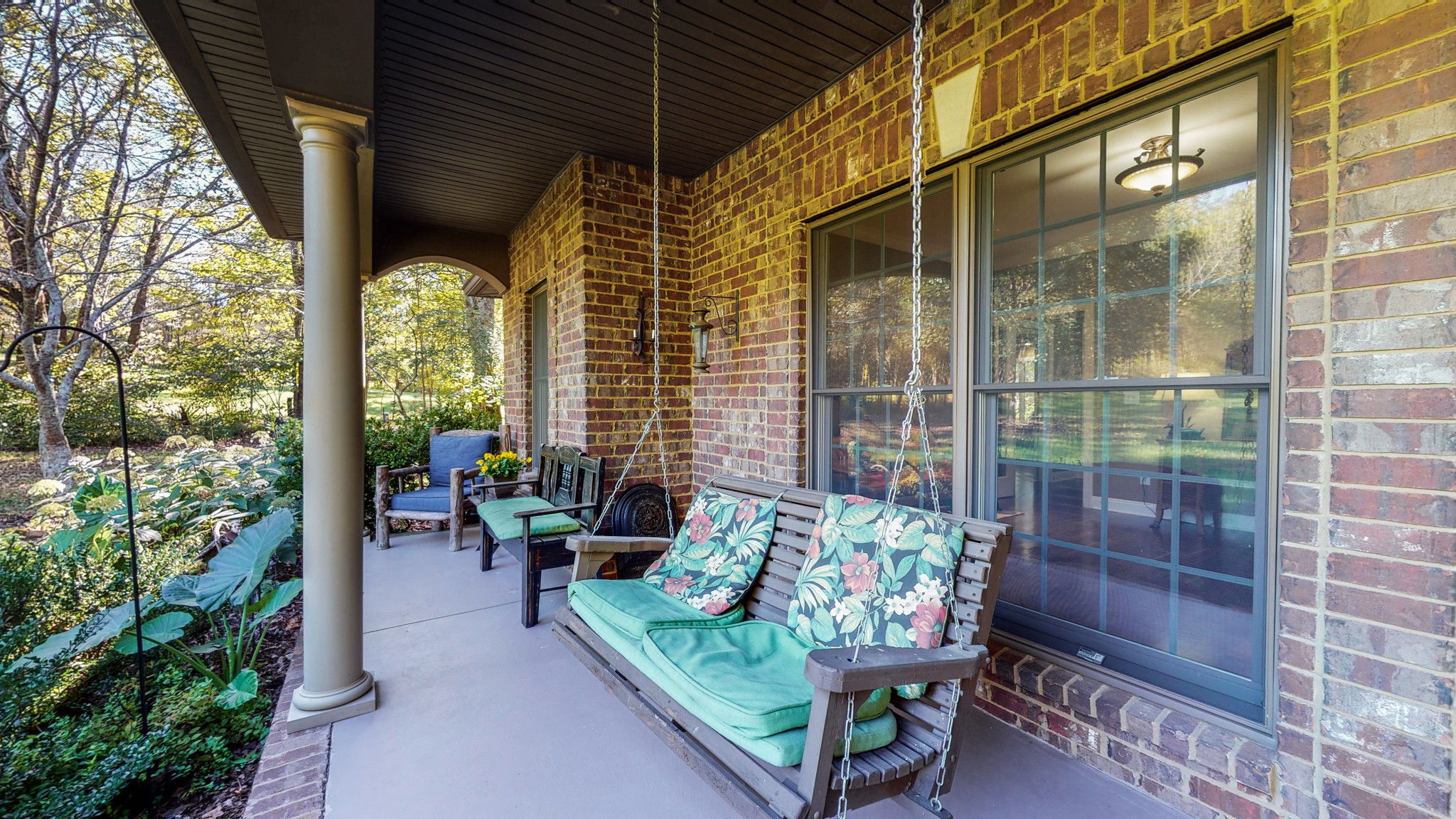 841 Vanderbilt Road Mount Juliet, TN 37122 - Photo 5 of 50 a view of a porch with chairs and potted plants