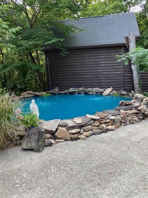 841 Vanderbilt Road Mount Juliet, TN 37122 - Photo 50 of 50 a view of a backyard with plants and a barbeque