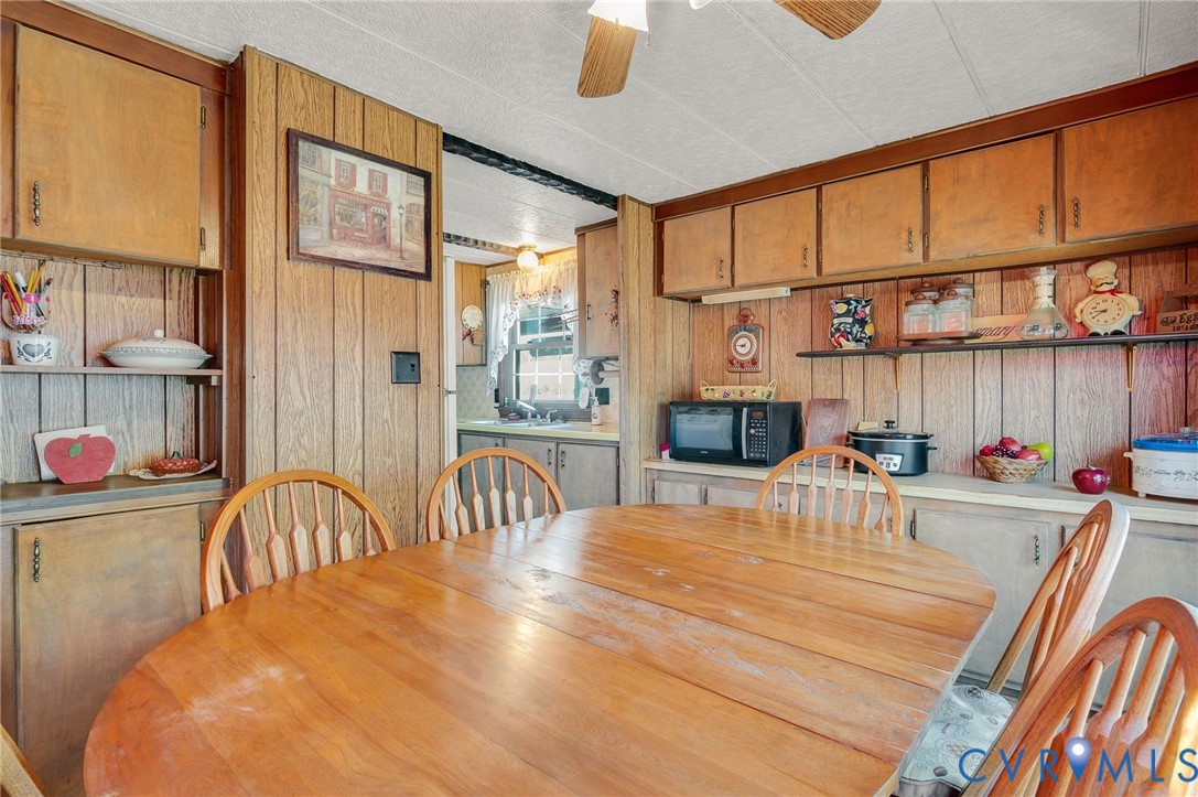 475 Dove Road Boydton, VA 23917 - Photo 10 of 45 a bedroom with a bed and a table