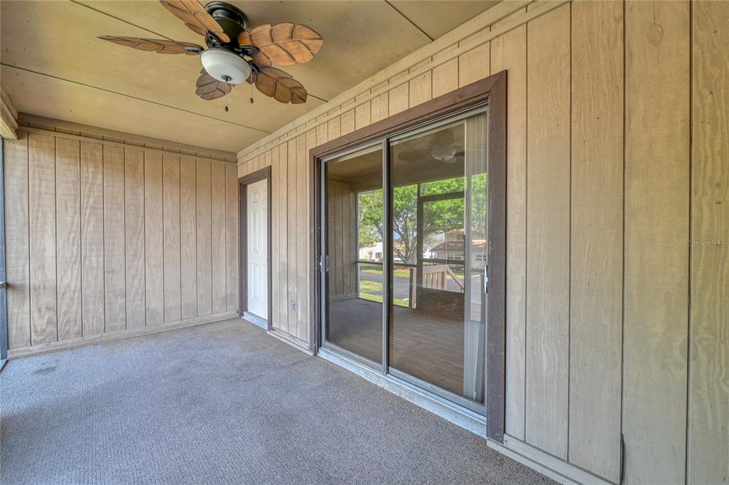 11001 Southeast Sunset Harbor Road, Unit H52 Summerfield, FL 34491 - Photo 16 of 31 a view of an empty room and a window