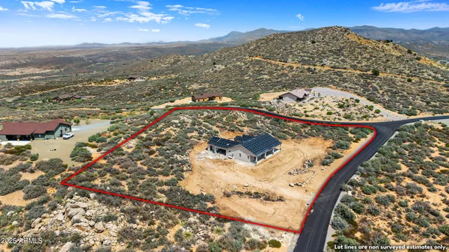 a view of house with backyard of the house