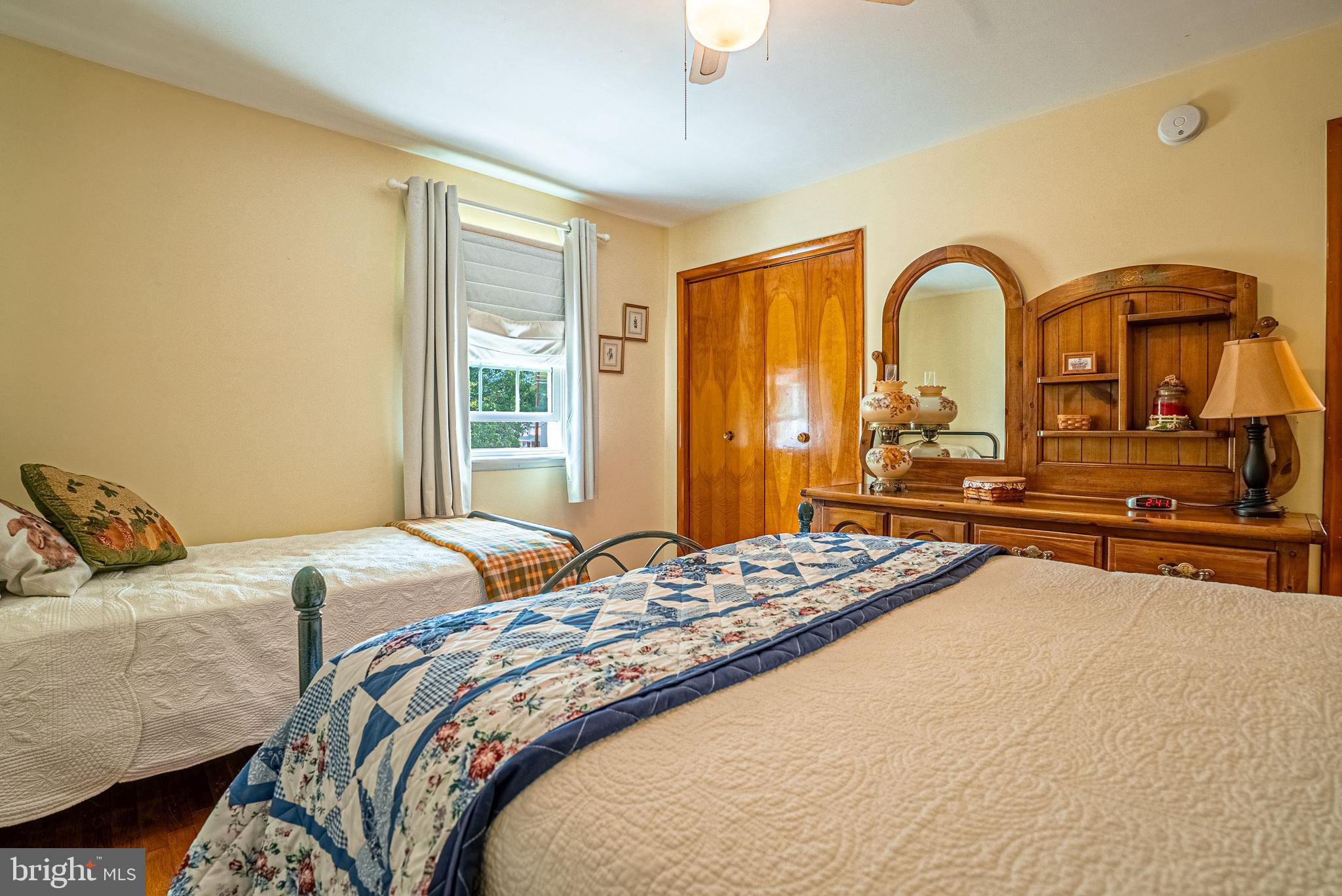 14100 Brant Road Southwest Cumberland, MD 21502 - Photo 20 of 40 a bedroom with bed and a window