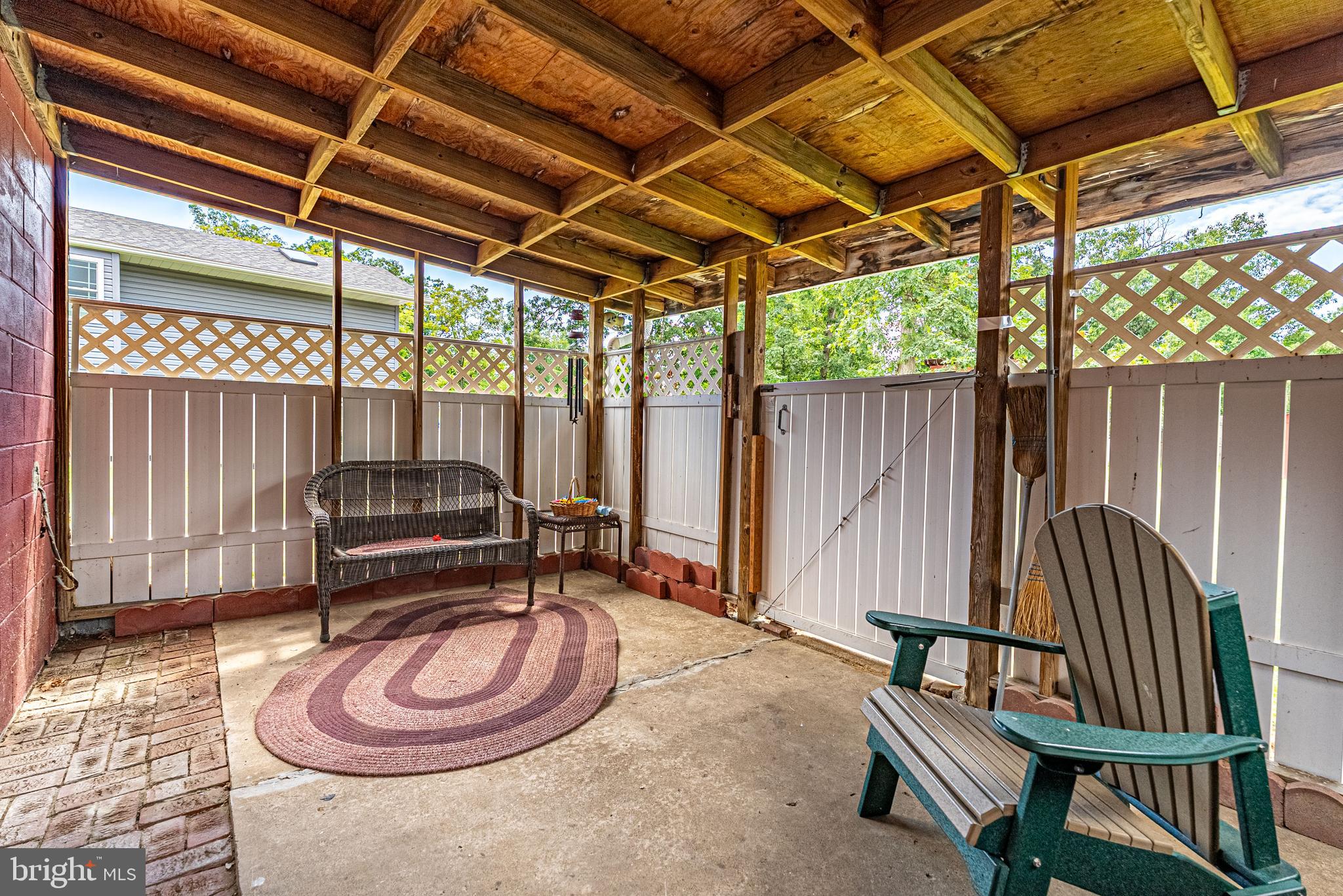 14100 Brant Road Southwest Cumberland, MD 21502 - Photo 23 of 40 a backyard of a house with table and chairs