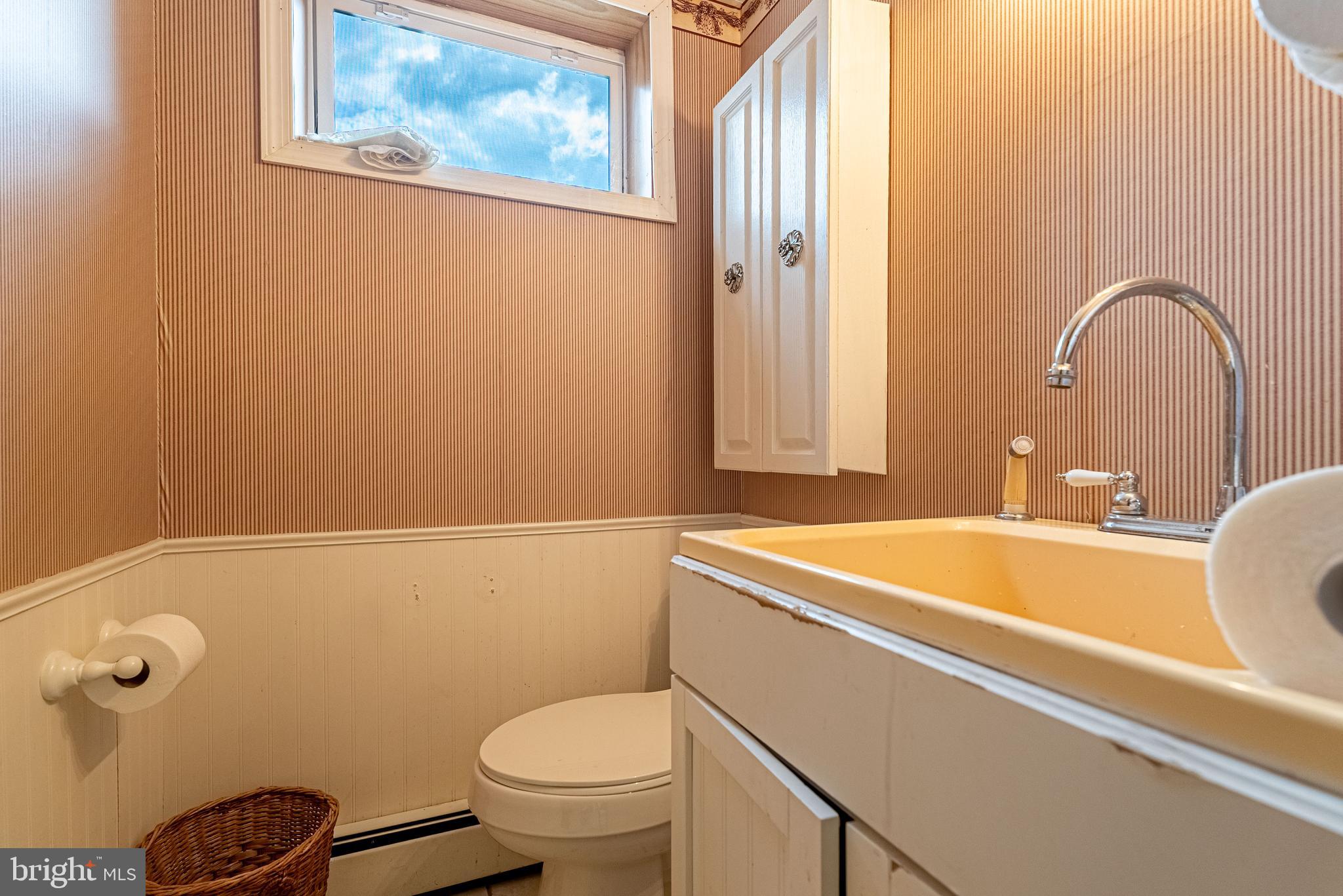 14100 Brant Road Southwest Cumberland, MD 21502 - Photo 28 of 40 a bathroom with a sink and a toilet