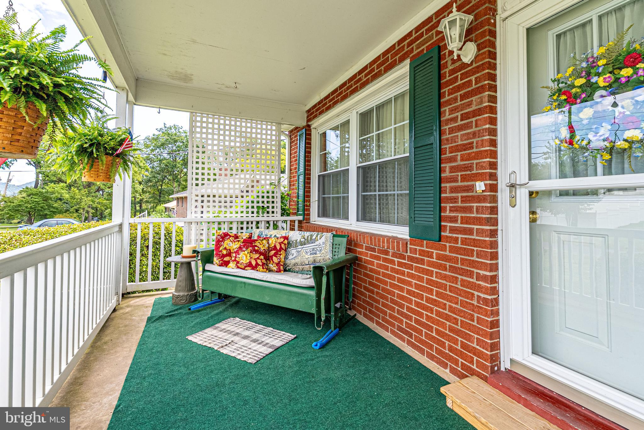 14100 Brant Road Southwest Cumberland, MD 21502 - Photo 3 of 40 a front view of a house with garden