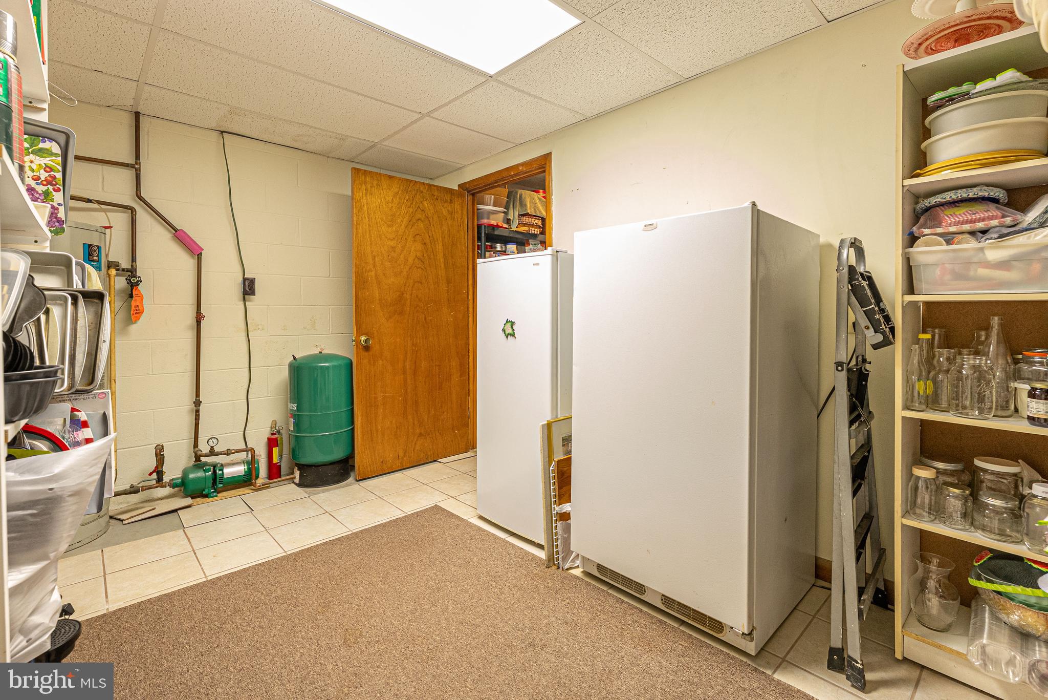14100 Brant Road Southwest Cumberland, MD 21502 - Photo 31 of 40 a view of walk in closet with window