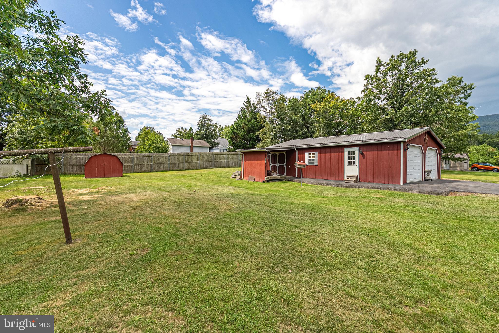 14100 Brant Road Southwest Cumberland, MD 21502 - Photo 35 of 40 a view of a house with backyard porch and garden