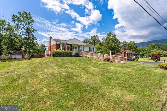 a view of a house with a big yard
