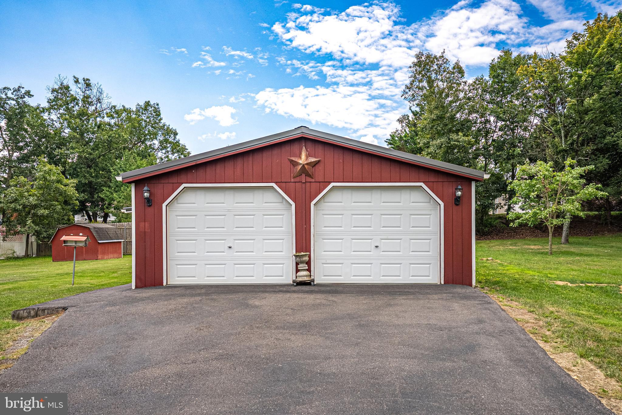 14100 Brant Road Southwest Cumberland, MD 21502 - Photo 5 of 40 a front view of house with yard garage and green space