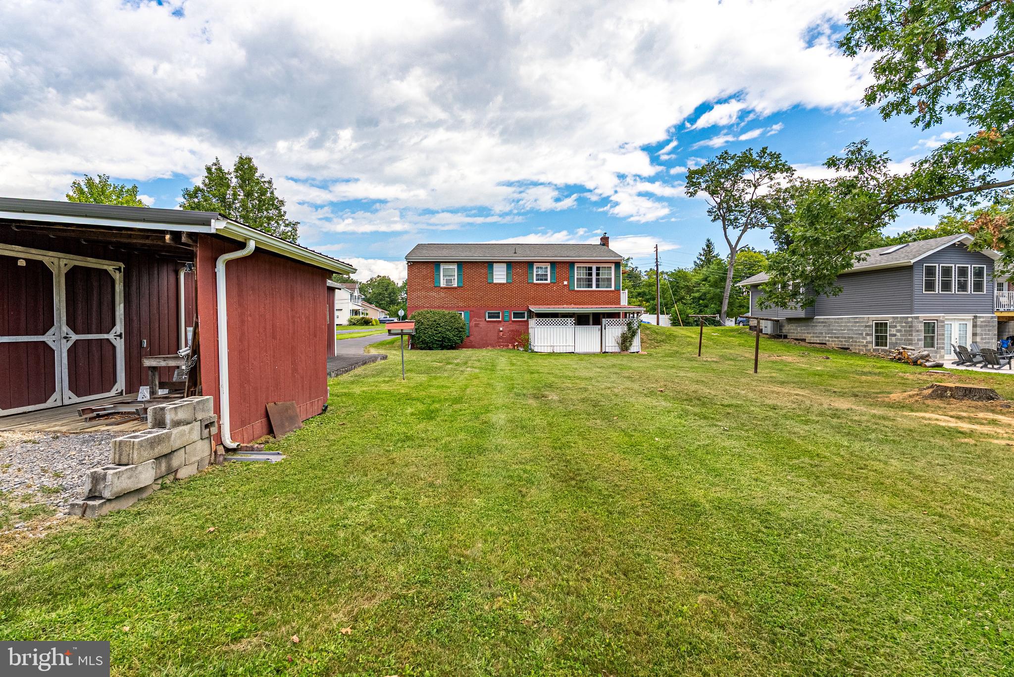 14100 Brant Road Southwest Cumberland, MD 21502 - Photo 6 of 40 a view of a house with backyard and a tree
