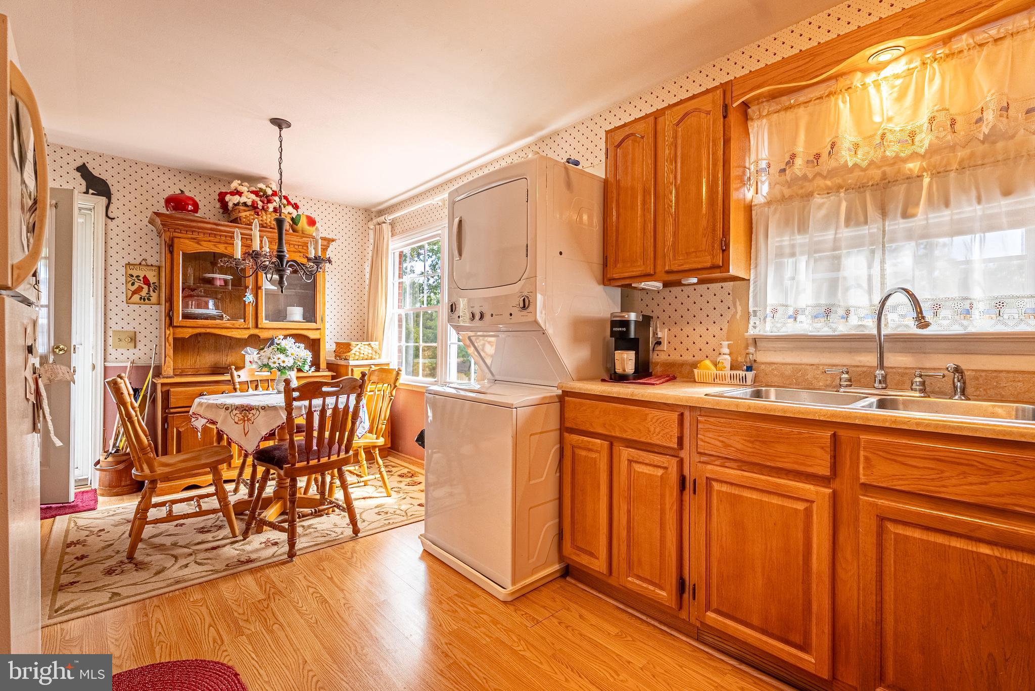 14100 Brant Road Southwest Cumberland, MD 21502 - Photo 9 of 40 a kitchen with cabinets and chairs